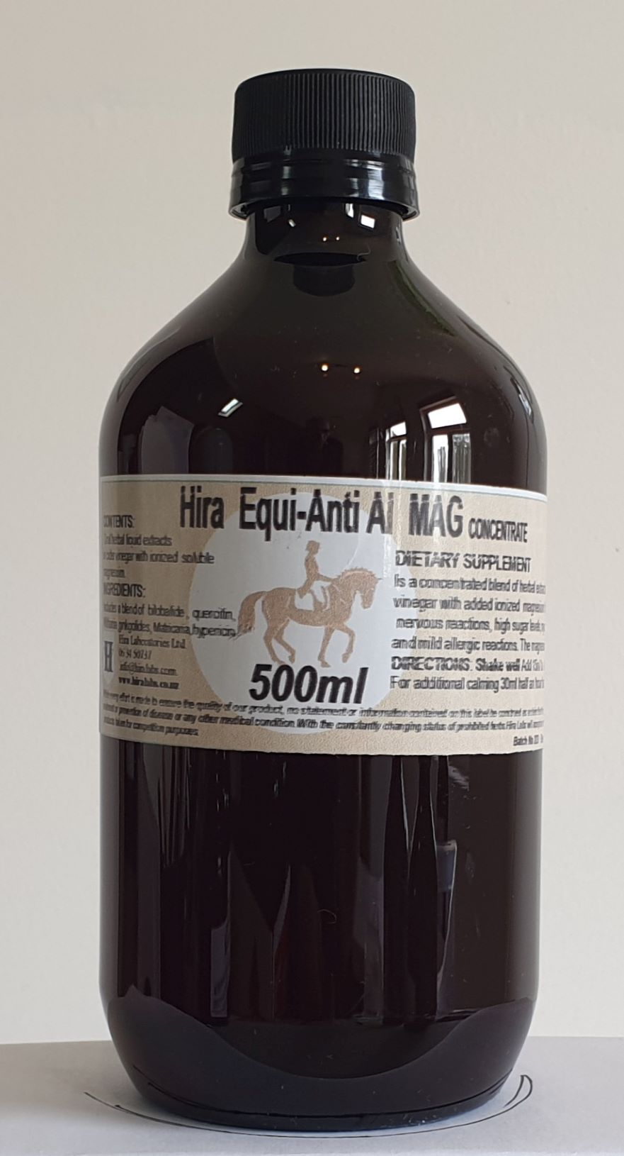 an amber bottle contains 500ml magnesium liquid